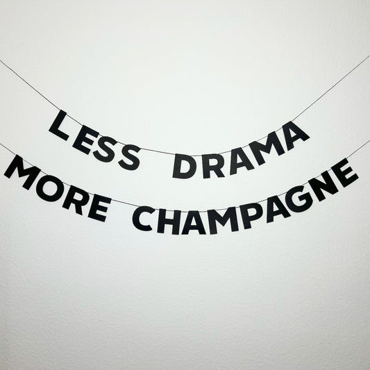 LESS DRAMA MORE CHAMPAGNE