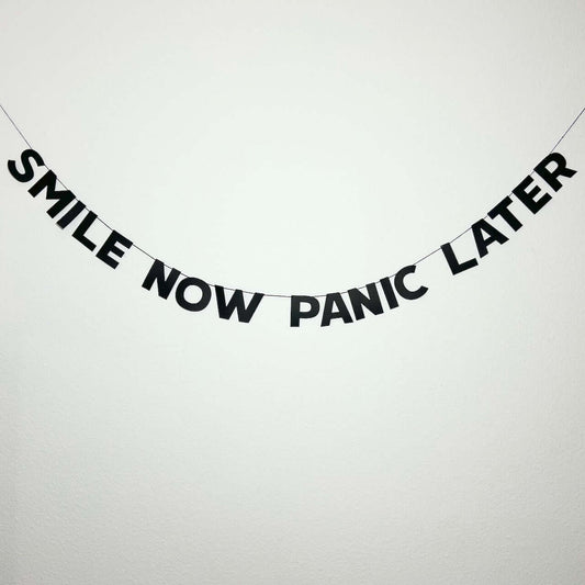 SMILE NOW PANIC LATER